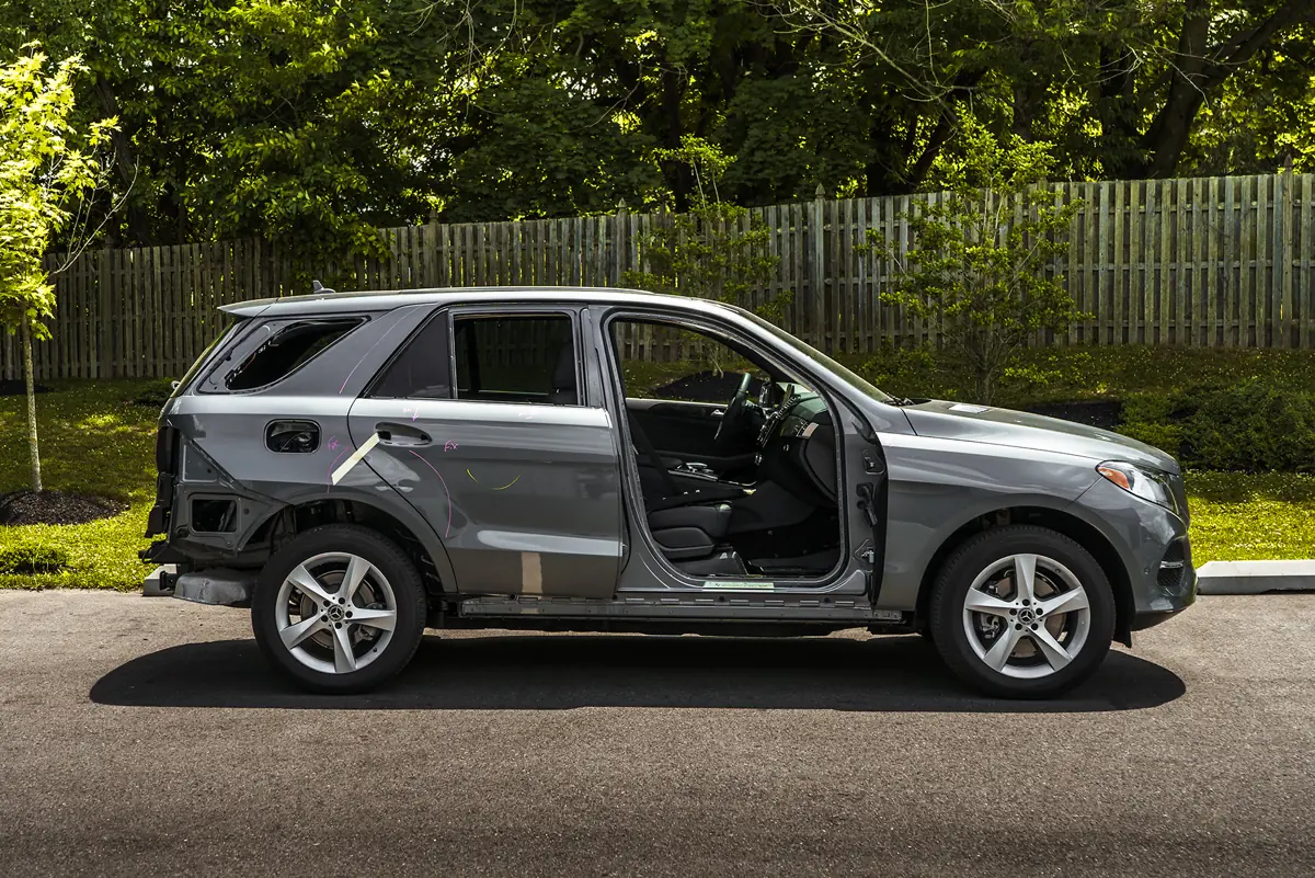 Mercedes-Benz taken apart for collision repair at Moppert Auto Collision